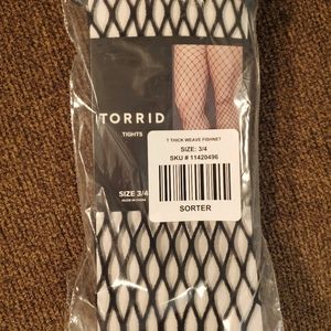 Torrid black lace fishnet stocking, size 3/4